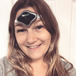 From "Brutal" Headaches to Relief: Melissa's Migraine Story a smiling woman wearing a CEFALY device on her forehead